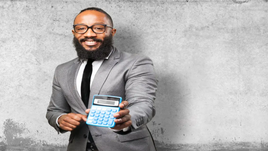 man-smiling-with-calculator